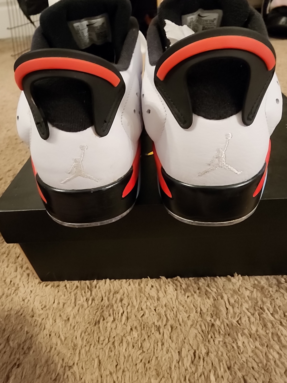 Air Jordan Retro Low-Top Sneakers in White and Black with Infrared Accents